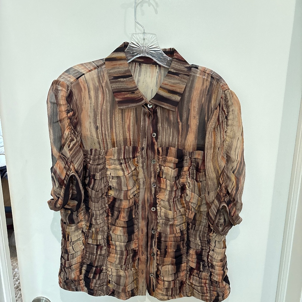 Worth silk shirt beautiful shades of brown with great details.   Size 12